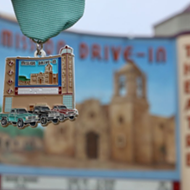 Fiesta Medal Pays Tribute to Southside Landmark Mission Drive-In Theatre