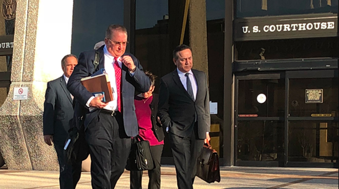 Attorney Michael McCrum and Carlos Uresti exit U.S. federal courthouse. - ALEX ZIELINSKI