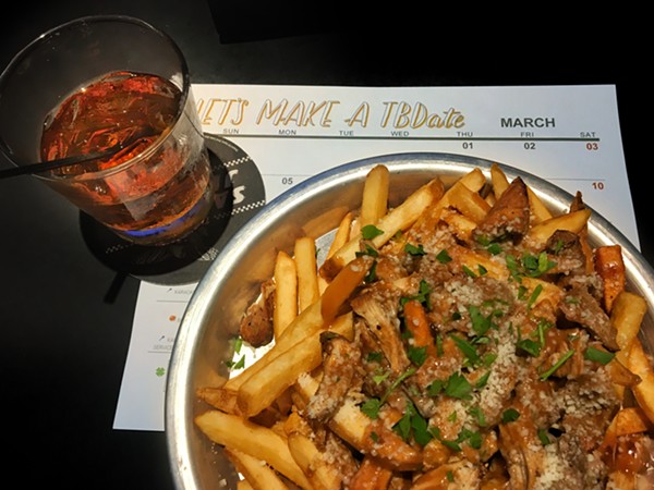 Loaded Fries and well drinks - ERIN W.