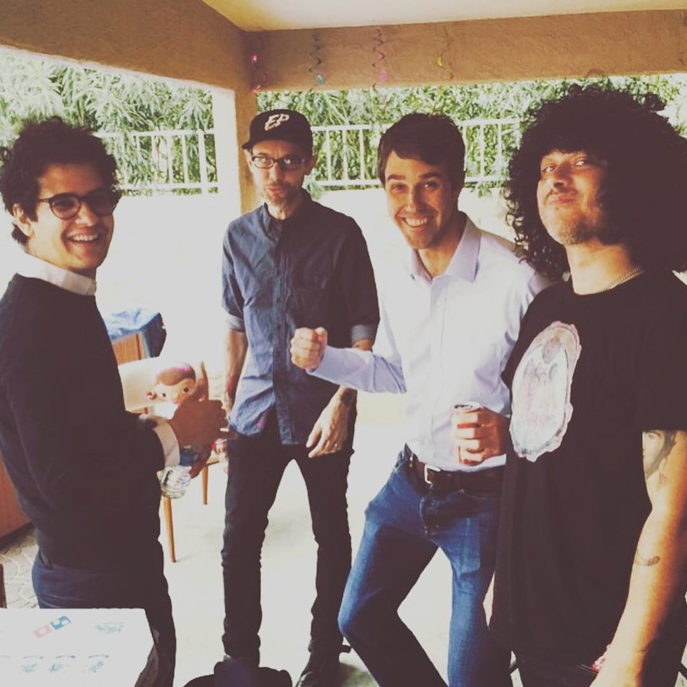 Beto hangs out with former bandmate Cedric Bixler-Zavala, right, and members of At the Drive-In - SANFORD NOWLIN