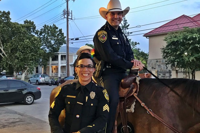 Bexar County Sheriff Javier Salazar with Sgt. Stephanie Flores at this year's Pride Parade. - Courtesy