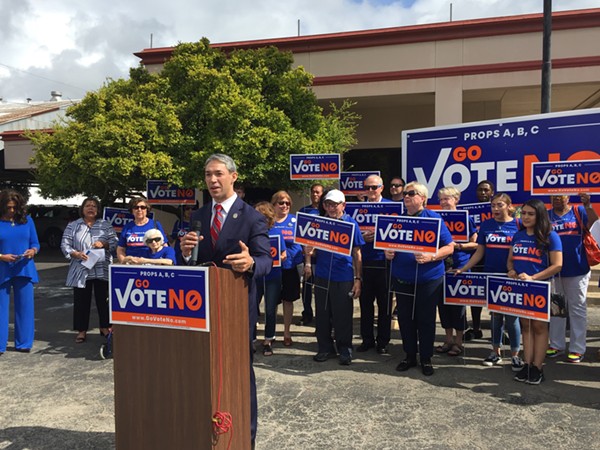 Mayor Ron Nirenberg speaks at the Go Vote No presser, surrounded by local Democrats. - SANFORD NOWLIN