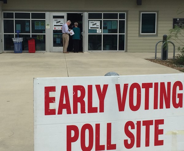 Early voters line up at a San Antonio polling site. - SANFORD NOWLIN