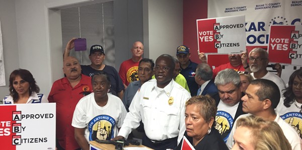 Fire union officials speak at a press conference during the runup to the charter amendment vote. - SANFORD NOWLIN
