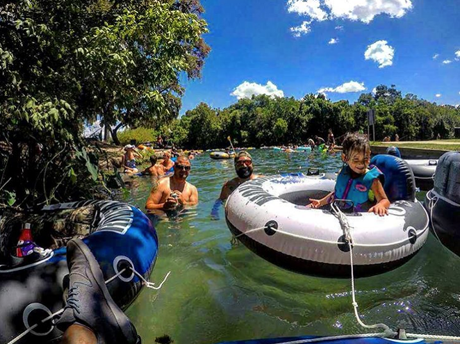 Tubers enjoy sun and suds on New Braunfels' Comal River. - Instagram / DerrrikRage