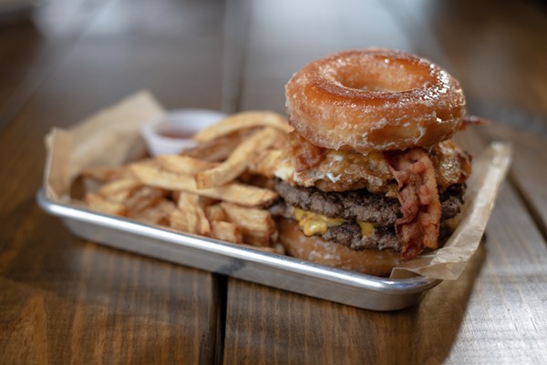 The Krispy Kreme Brunch Burger from Lucy Cooper's Ice House - ERIK GUSTAFSON