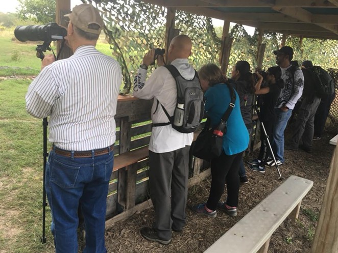 Bird-watchers engage in their hobby at the National Butterfly Center, one of the parks threatened by a planned section of the border wall. - FACEBOOK / NATIONAL BUTTERFLY CENTER