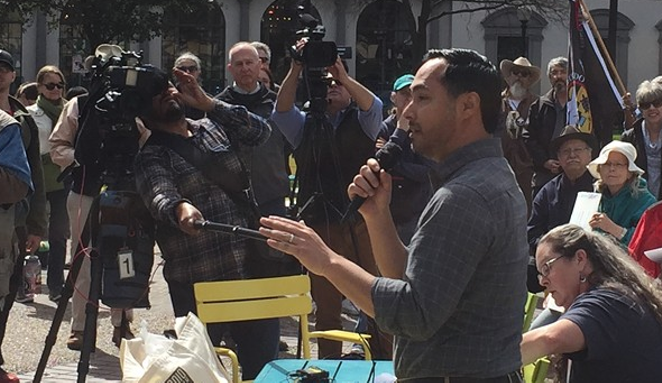 Joaquin Castro speaks to a crowd at a recent immigration rally in San Antonio. - SANFORD NOWLIN