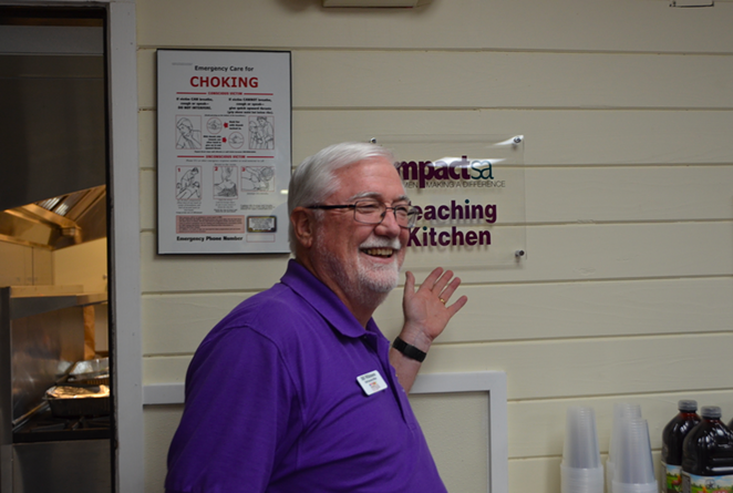 RMYA CEO Bill Wilkinson unveils the new kitchen during the Tuesday Grand Opening. - LEA THOMPSON