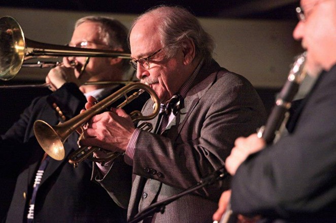 Jim Cullum playing trumpet during a gig - Facebook, Jim Cullum