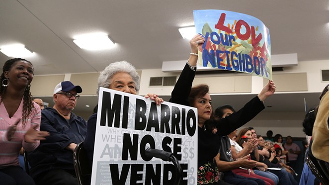 Elisa Diaz (center) and Bertie Diaz-Gonzales attend a City Council candidate forum hosted by COPS Metro Alliance in April at St. Patrick’s Catholic Church, where gentrification and affordable housing was the hot topic. - Ben Olivo / San Antonio Heron