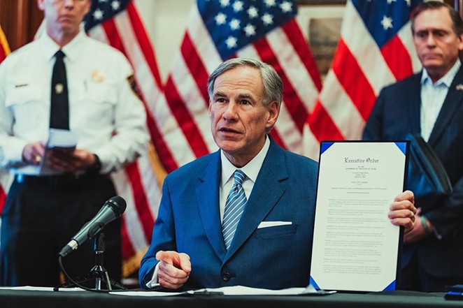 Texas Gov. Greg Abbott shows off an order signed during the coronavirus pandemic. - INSTAGRAM / @GOVERNORABBOTT