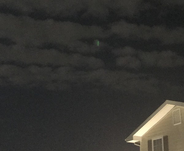 Locals were baffled by a mysterious green light in the sky. - Reddit / HeresJonesy