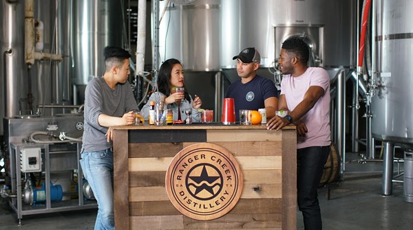 First-time homebuyers Kino (far left) and Mi taste local spirits at Ranger Creek Brewstillery on episode one of ‘Beyond the Block.’ - Courtesy ‘Beyond the Block’