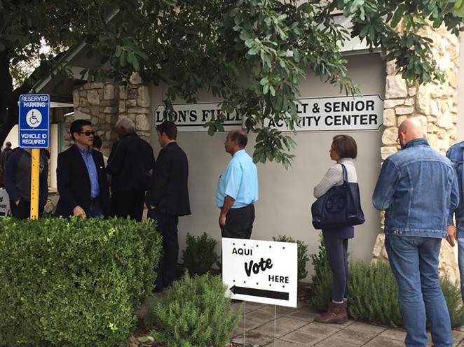 Voter wait in line to cast their ballots at Lion's Field in San Antonio. - SANFORD NOWLIN