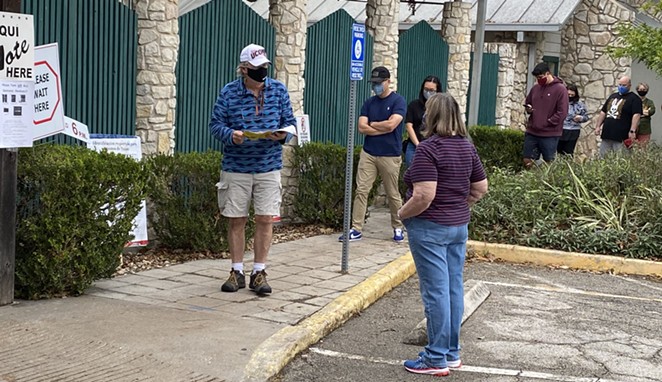Voters line up outside of the Lion's Field voting site early this week. - SANFORD NOWLIN