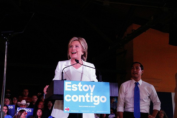 Hillary Clinton speaks as Julian Castro looks on at a rally on Thursday at Sunset Station. - GABBY MATA
