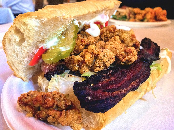 The Peacemaker po'boy with fried oysters and house-made bacon at The Cookhouse. - Jessica Elizarraras