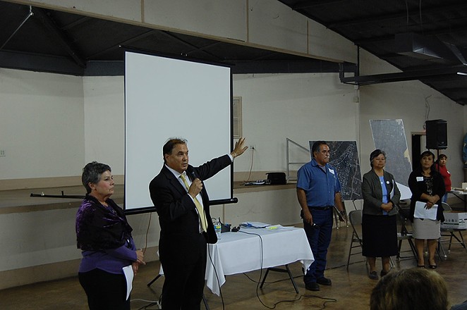 Bexar County Commissioner Chico Rodriguez speaks at a Highland Oaks community meeting. - Michael Marks