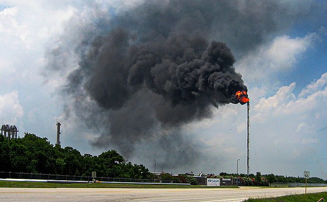 Gas flares above the Bayport Industrial District in Harris County. - WIKIMEDIA COMMONS / JIM EVANS