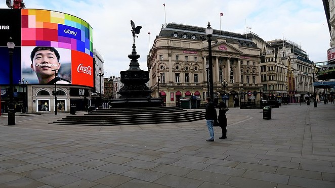 London's Piccadilly Circus is shown almost deserted during a coronavirus lockdown in October. - WIKIMEDIA COMMONS / KWH1050
