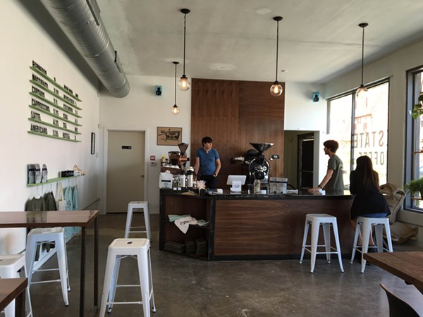 Estate Coffee Company owner Brian Labarbera and barista and roaster Alex Dyck work behind the counter. - JESSICA ELIZARRARAS | SAN ANTONIO CURRENT