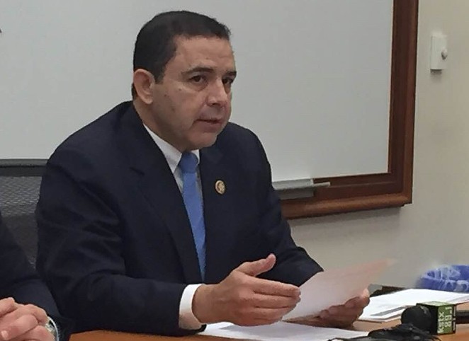 Henry Cuellar speaks to the press during a 2019 stop in San Antonio. - SANFORD NOWLIN