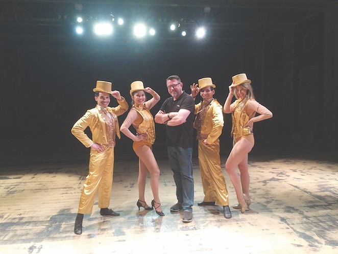 Tim Hedgepeth (center) with cast members of The Playhouse’s production of A Chorus Line - PHOTO BY SIGGI RAGNAR