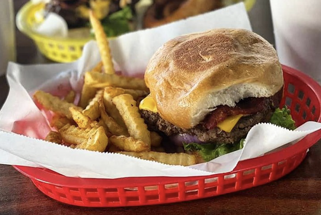 Local burger joint Mark's Outing is offering a bacon cheeseburger on a homemade honey bun for Black Restaurant Week San Antonio 2021. - INSTAGRAM / MARKSOUTING