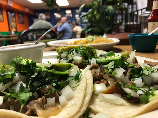 A view of the street tacos and the dining room at Little Taco Factory.
