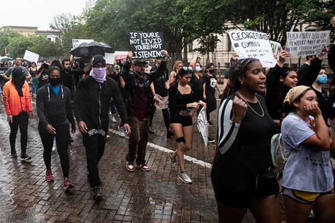 Black Lives Matter protesters march in downtown San Antonio last June. - JAIME MONZON