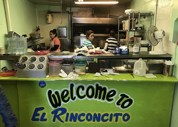 You pass the kitchen on the way to the dining area at El Rinconcito. - Ben Olivo
