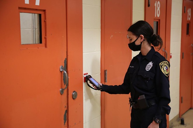 A deputy at the Bexar County Jail checks in on inmates using a new digital system meant to improve accountability. - COURTESY OF BEXAR COUNTY SHERIFF'S OFFICE