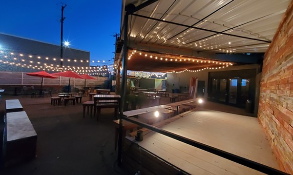 Artisan Brewery and Distillery's new space features two large stages. - Photo Courtesy Artisan Brewery and Distillery