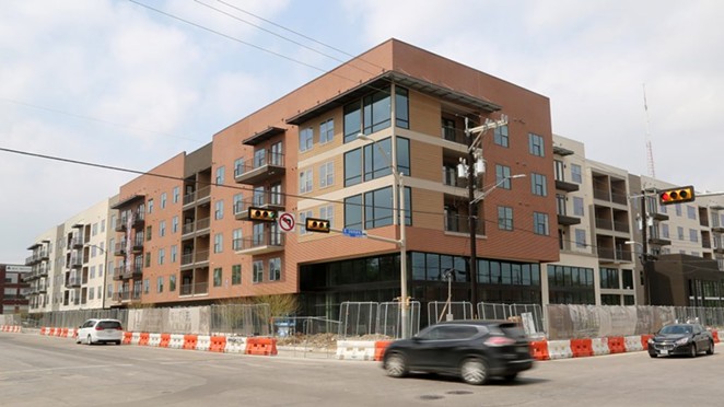 The Flats at River North is nearing completion at the corner of Broadway and Jones Avenue. - BEN OLIVO / SA HERON