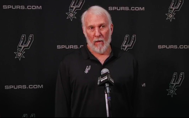 Spurs Coach Gregg Popovich speaks at a news conference in his less shaggy days. - Facebook / San Antonio Spurs