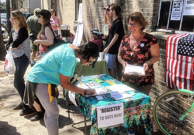 Organizers operate a recent voter registration drive. - WIKIMEDIA COMMONS / BART EVERSON
