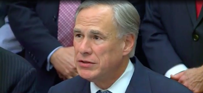 Gov. Greg Abbott amps up the rhetoric during Wednesday's news conference about a Texas border wall. - SCREEN CAPTURE / KXAN-TV
