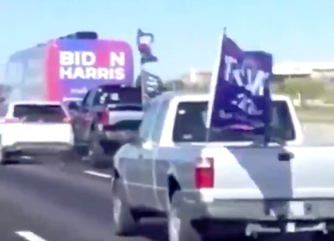 Video shared by a Twitter user shows Trump supporters harassing a Biden tour bus along a stretch of I-35 near San Marcos. - TWITTER / ERICCERVINI