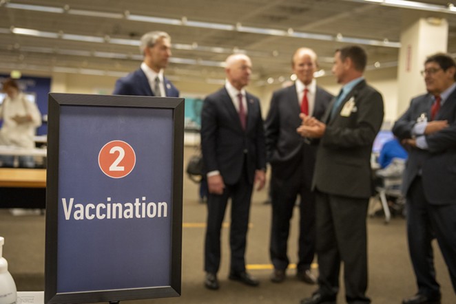 Homeland Security Secretary Alejandro Mayorkas (second from left) tours the mass vaccination site at San Antonio's Wonderland of the Americas mall. - TWITTER / SECMAYORKAS