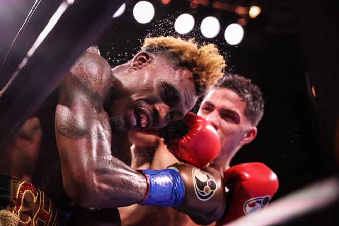 Castaño connects a forceful punch during Saturday's fight. - AMANDA WESTCOTT / SHOWTIME