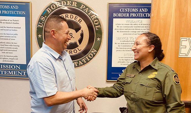 San Antonio-area U.S. Rep. Tony Gonzales does the old "grip and grin" during an October visit to a Border Patrol facility. - Twitter / @TonyGonzales4TX