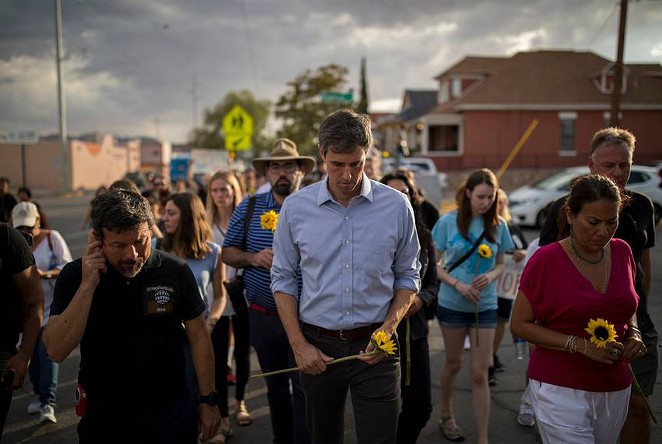 Then-presidential candidate Beto O’Rourke, center, walked with U.S. Rep. Veronica Escobar, D-El Paso, in August 2019 during a silent march for people who lost their lives in a mass shooting at a local Walmart. - TEXAS TRIBUNE / IVAN PIERRE AGUIRRE