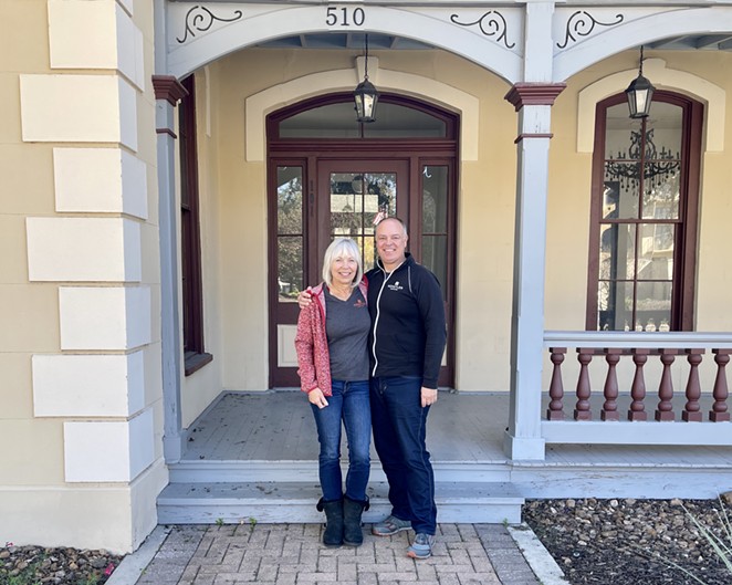 Künstler Brewing owners Vera (left) and Brent Deckard stand in front of the historic Pereida House at Hemisfair. - COURTESY KÜNSTLER BREWING