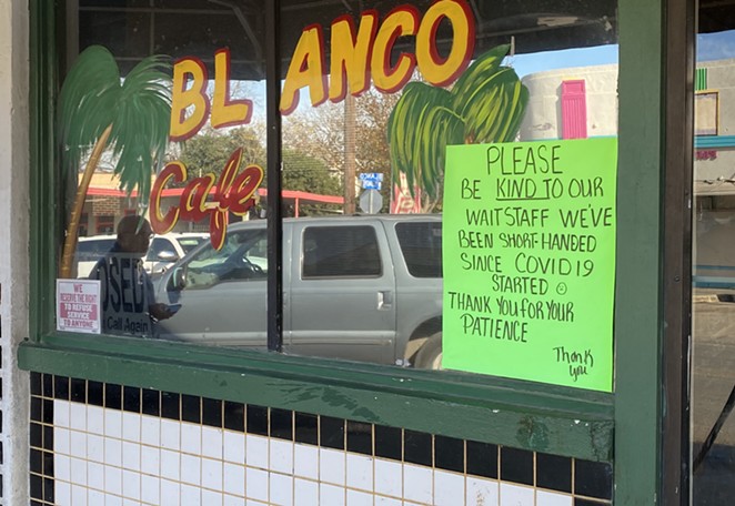A sign in the window of Blanco Cafe reads, "Please be kind to our waitstaff. We've been short-handed since COVID19 started. Thank you for your patience." - Sanford Nowlin