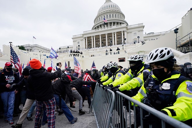Insurrectionists tangle with police during the Jan. 6 insurrection at the U.S. Capitol. - Shutterstock