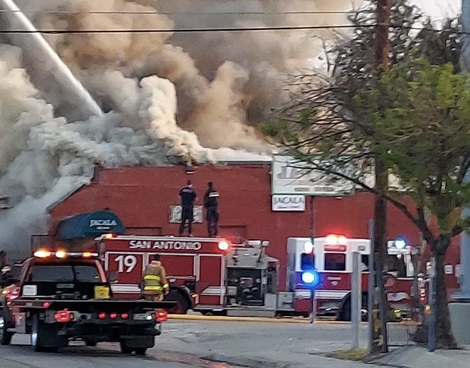 Firefighters work to contain the blaze at Jacala Mexican Restaurant. - Instagram / gdgnjk