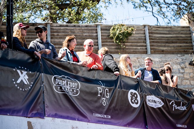 Audience members watch a show at SXSW. You’re never far from corporate branding at the festival. - Jaime Monzon