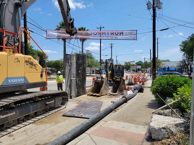 Construction crews work on North St. Mary's Street. The project, part of the 2017 bond, continues to drag on, much to business owners' dismay. - Travis E. Poling