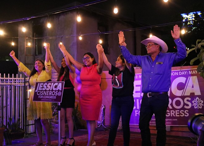 Congressional candidate Jessica Cisneros joins her family for a victory pose. - Twitter / @JCisnerosTX